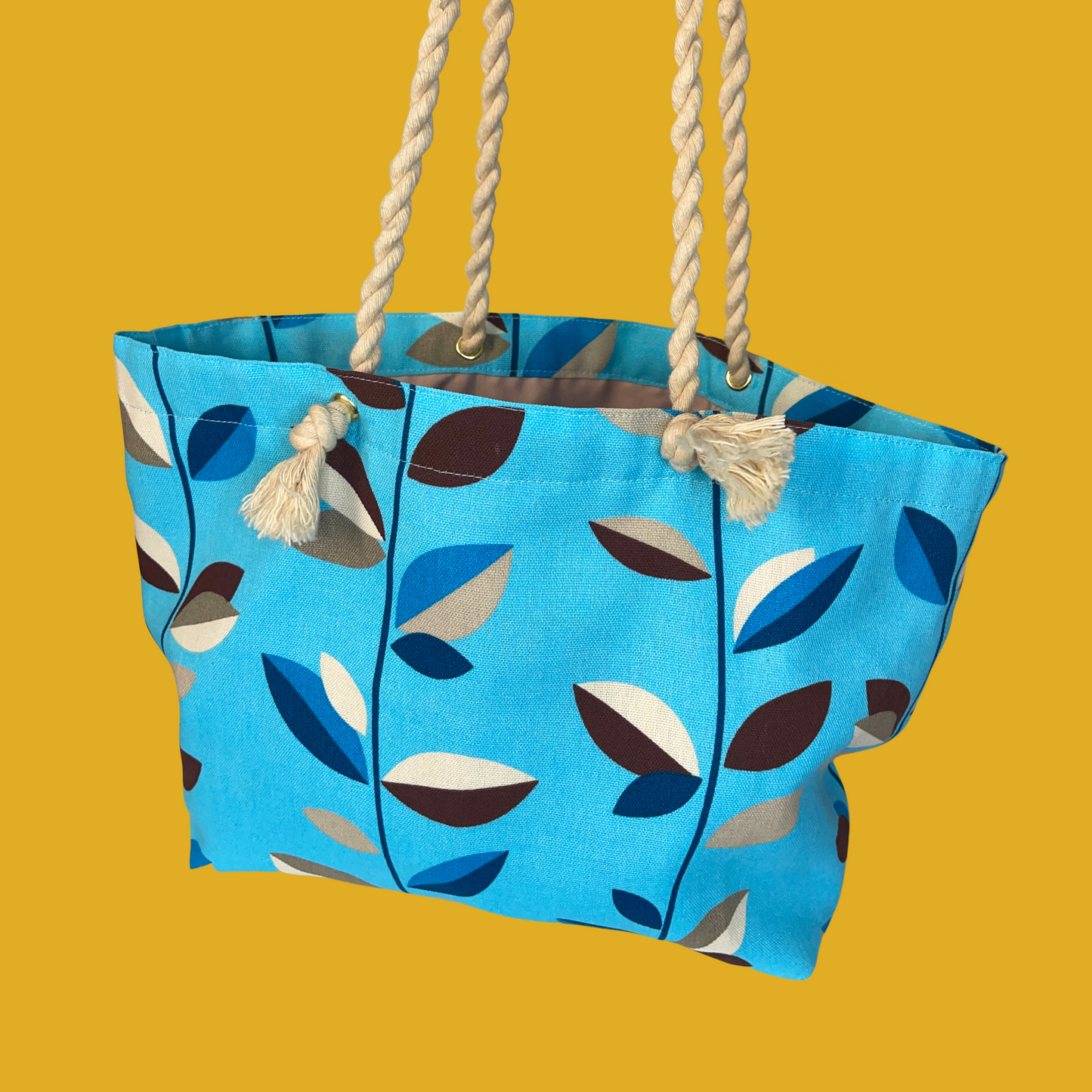 9. Tote bag - Turquoise with beige, brown and blue leaves, rope handle and an inside pocket