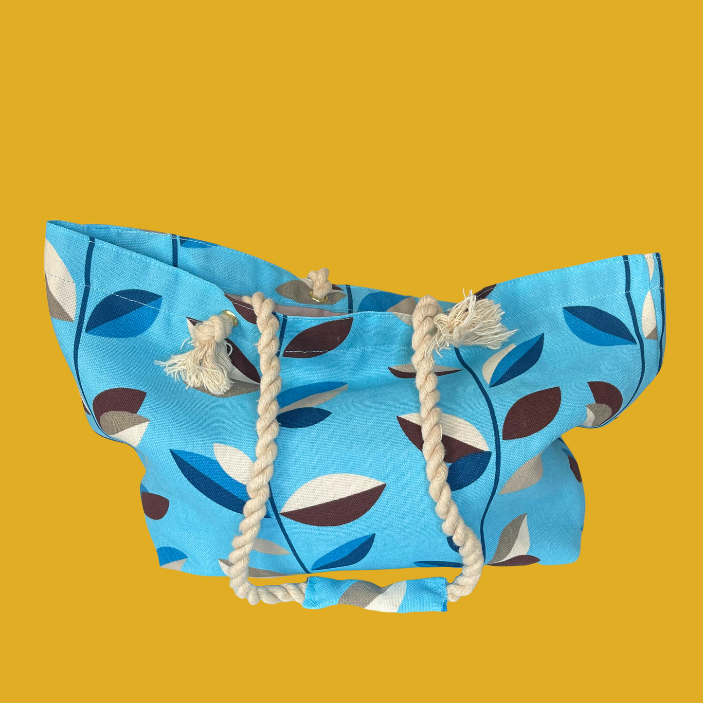 9. Tote bag - Turquoise with beige, brown and blue leaves, rope handle and an inside pocket