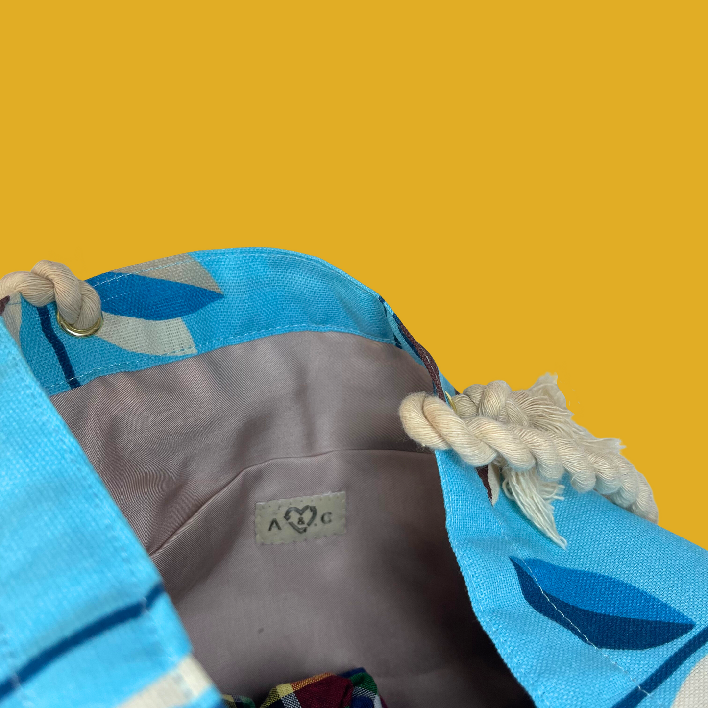 9. Tote bag - Turquoise with beige, brown and blue leaves, rope handle and an inside pocket